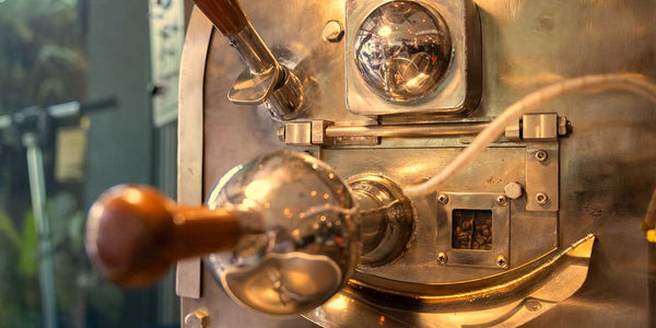 beautiful old copper roaster at top of Coffee Equipment Pros' used elite roaster page