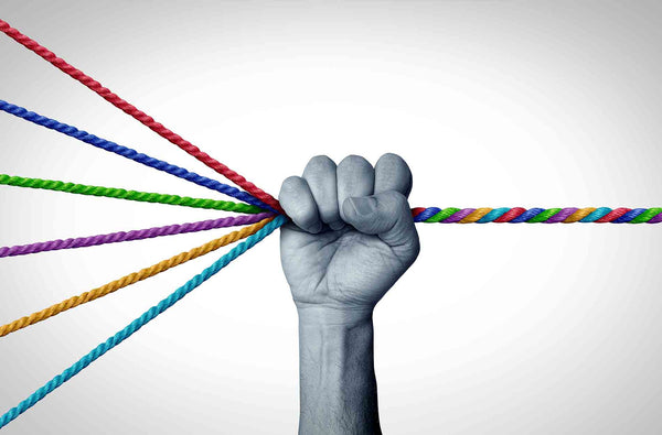 image of a hand grasping six colored ropes on one side that blend into one organized rope signifying the power of working with Coffee Equipment Pros as a one-stop shop