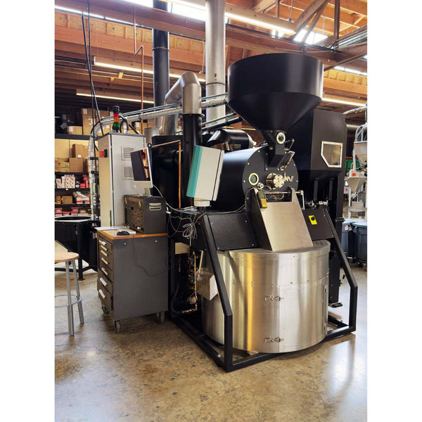Left angled view of a 2023 IMF RM30 30kg used commercial coffee roaster with loader, destoner, and afterburner — immaculate condition.