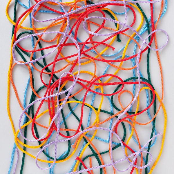 image of tangled string signifying the tangled mess and hassle of shopping around for coffee roastery equipment