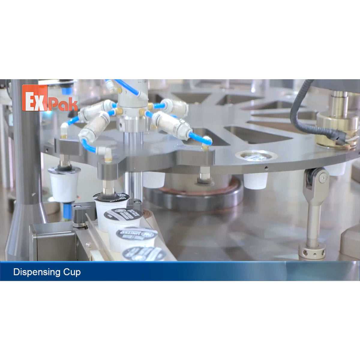 Expak K-cup Filling and Sealing Machine - Expak CR90 Rotary w/Vacuum Conveyo