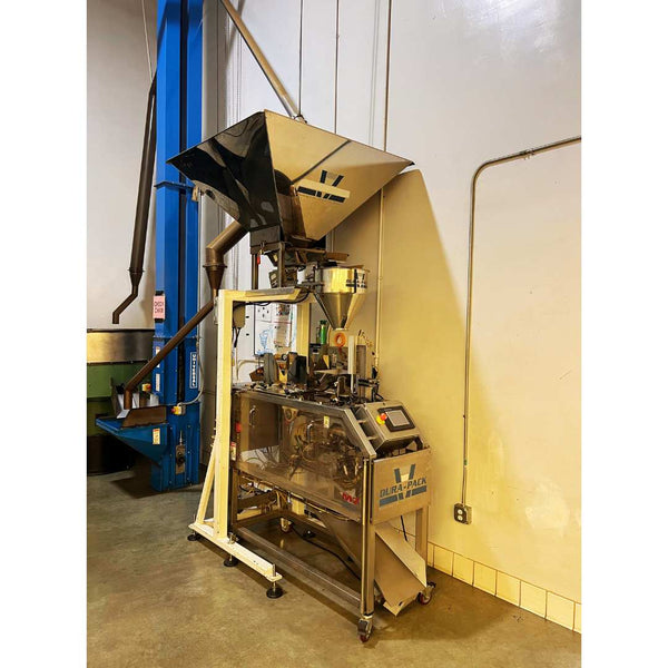 Angled view of Dura-Pack M7 pouching machine, used coffee equipment, capable of high-speed coffee packaging with premade pouches.