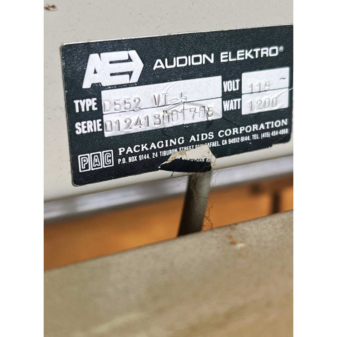 Plate detail of Dura-Pack M7 pouching machine, used coffee equipment, capable of high-speed coffee packaging with premade pouches.