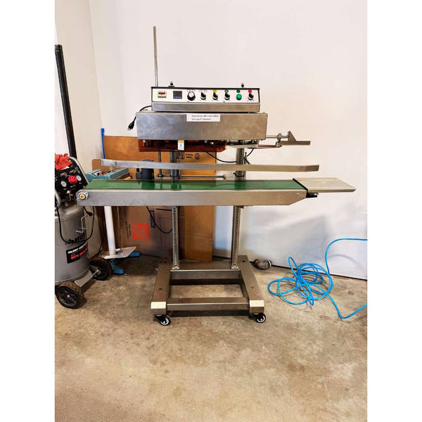 2023 Youlian QLF-1680 vertical band coffee bag sealer, used coffee equipment in excellent condition, ready for high-volume packaging.