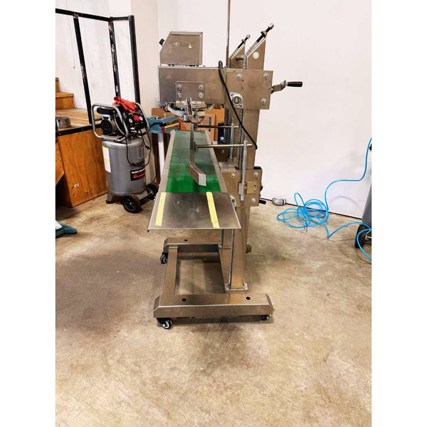 Side view of 2023 Youlian QLF-1680 vertical band coffee bag sealer, used coffee equipment in excellent condition, ready for high-volume packaging.